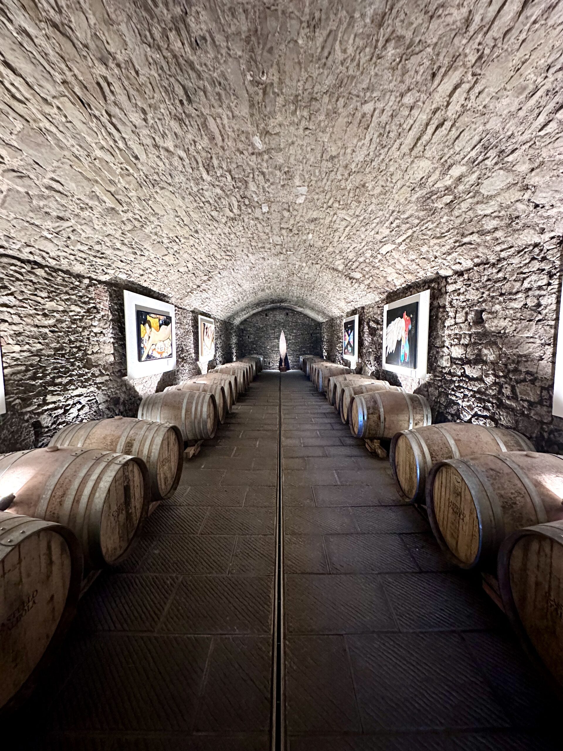 supertuscan wines ageing in wood oak barrels in chianti