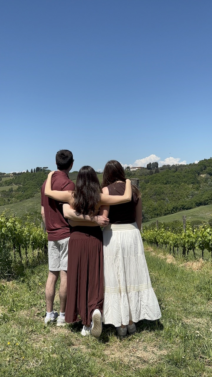 Friends taking in the Chianti Classico vineyards, Tuscany